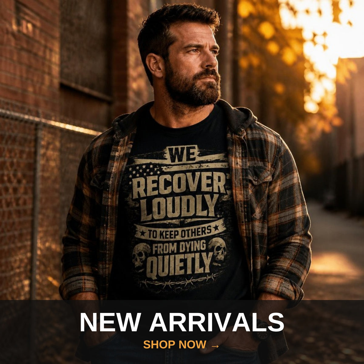 New arrivals recovery apparel - man in We Recover Loudly tee at fall sunset