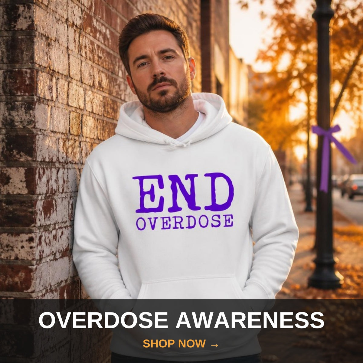 Overdose awareness apparel - man in white End Overdose hoodie at fall sunset