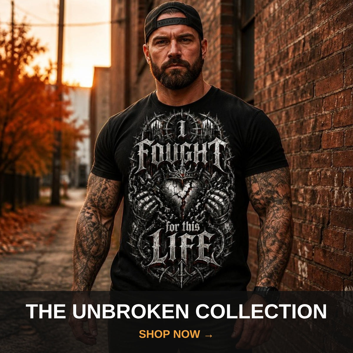 The Unbroken Collection - man in I Fought For This Life recovery t-shirt in a city alley at fall sunset