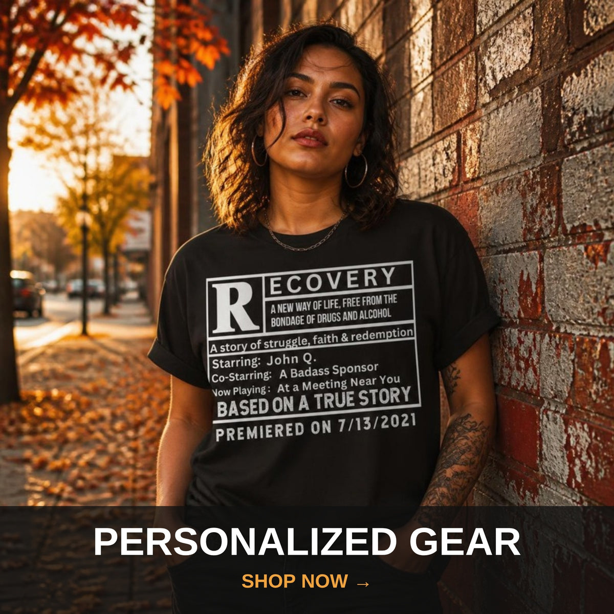 Personalized recovery gear - woman in custom Rated R For Recovery tee at fall sunset