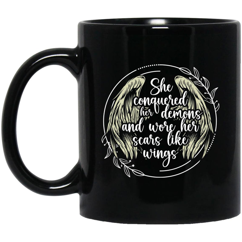 Womens addiction recovery black ceramic coffee mug She Conquered Her Demons and Wore Her Scars Like Wings